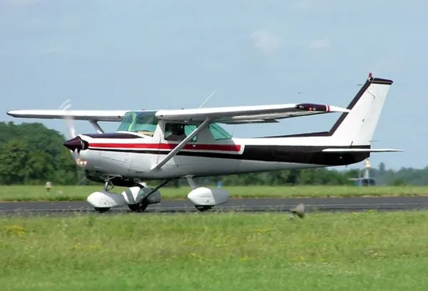 Cessna 152 aircraft parked at airfield